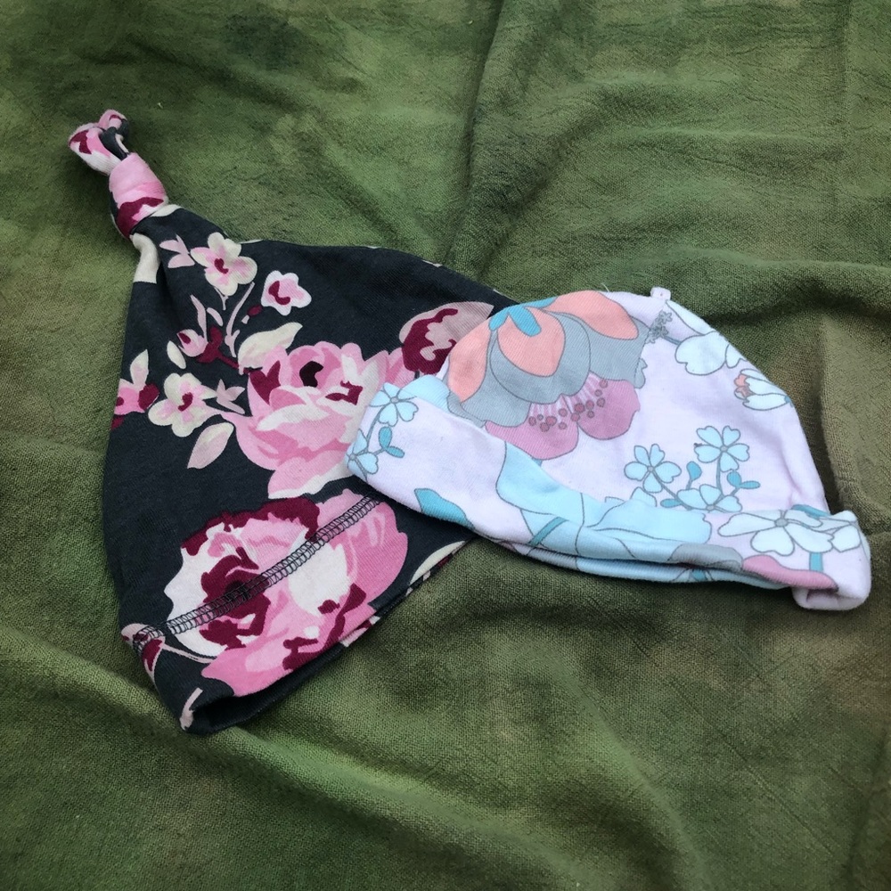2 floral baby hats
